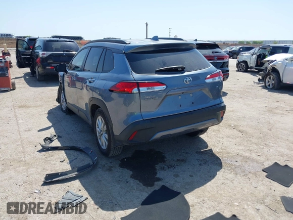 2023 Toyota Corolla Cross LE with VIN 7MUCAAAGXPV045651, listed as a IAAI auction lot 42006289 with 23,282 mi miles and . Bid and sale history available at DreamBid. Image 3.