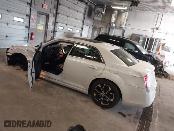2014 Chrysler 300 with VIN 2C3CCAAGXEH217715, listed as a IAAI auction lot 41666179 with 145,744 mi miles and . Bid and sale history available at DreamBid. Image 3.