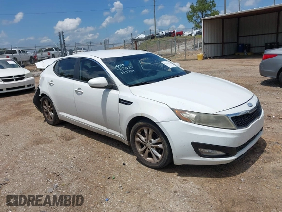 2013 Kia Optima LX z VIN 5XXGM4A79DG170660, wystawiony jako IAAI lot #42216942 z przebiegiem 210 481 mil mil oraz . Historia ofert i sprzedaży dostępna na DreamBid. Obrazek 1.