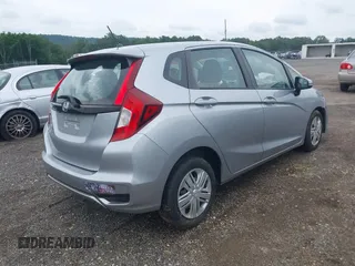 2019 Honda Fit LX z VIN 3HGGK5H45KM725916, wystawiony jako IAAI lot #42654907 z przebiegiem 92 580 mil mil oraz . Historia ofert i sprzedaży dostępna na DreamBid. Obrazek 4.