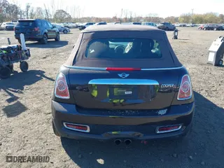 2013 MINI Cooper Convertible S with VIN WMWZP3C56DT705074, listed as a IAAI auction lot 40762024 with 57,685 mi miles. Bid and sale history available at carsss.com. Image 16.