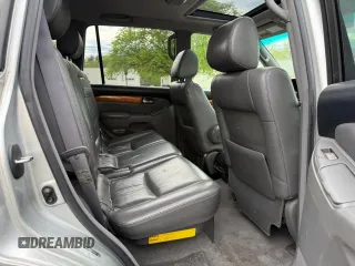 2006 Lexus GX 470 z VIN JTJBT20X860111393, wystawiony jako Copart lot #56594095 z przebiegiem 247 572 mil mil oraz Tytuł czysty. Historia ofert i sprzedaży dostępna na DreamBid. Obrazek 6.