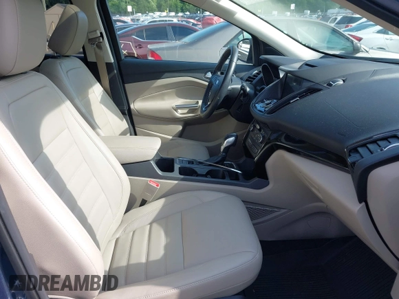 2018 Ford Escape Titanium with VIN 1FMCU9J92JUB01162, listed as a IAAI auction lot 42495112 with 96,280 mi miles and . Bid and sale history available at DreamBid. Image 5.