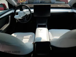 2024 Tesla Model Y Long Range with VIN 7SAYGDEE6RF995069, listed as a Copart auction lot 57085405 with 22,302 mi miles and Salvage title. Bid and sale history available at DreamBid. Image 8.