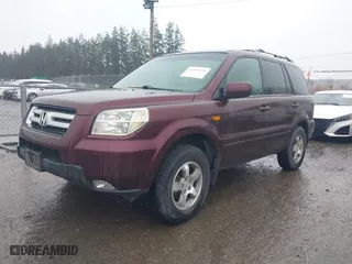 2007 Honda Pilot EX-L with VIN 2HKYF18787H534837, listed as a IAAI auction lot 41861438 with 199,355 mi miles. Bid and sale history available at carsss.com. Image 2.