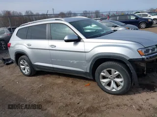 2018 Volkswagen Atlas SE with VIN 1V2KR2CA6JC560411, listed as a IAAI auction lot 41887472 with 168,155 mi miles and . Bid and sale history available at DreamBid. Image 19.