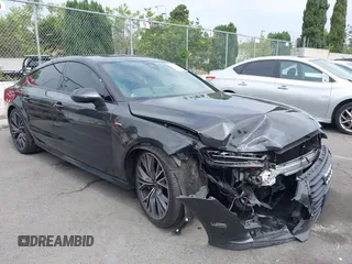 2016 Audi A7 Prestige z VIN WAU2GAFC4GN077072, wystawiony jako IAAI lot #42448417 z przebiegiem 90 081 mil mil oraz . Historia ofert i sprzedaży dostępna na DreamBid. Obrazek 1.