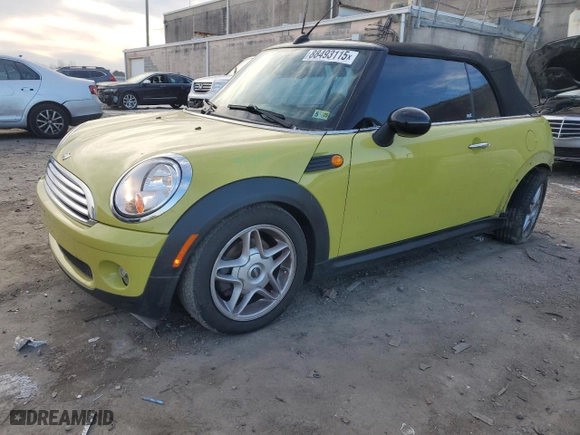 2009 MINI Cooper Convertible with VIN WMWMR33549TU95327, listed as a Copart auction lot 88493115 with 76,714 mi miles and Salvage Title. Bid and sale history available at carsss.com. Image 1.