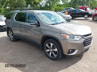 2018 Chevrolet Traverse LT z VIN 1GNEVHKW0JJ147686, wystawiony jako IAAI lot #42550692 z przebiegiem 79 098 mil mil oraz . Historia ofert i sprzedaży dostępna na DreamBid. Obrazek 1.