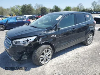 2017 Ford Escape SE z VIN 1FMCU9G91HUE28315, wystawiony jako Copart lot #53027285 z przebiegiem 96 830 mil mil oraz Szkoda całkowita • Salvage title. Historia ofert i sprzedaży dostępna na DreamBid. Obrazek 1.