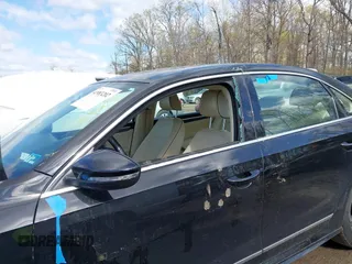 2016 Volkswagen Passat 1.8T S with VIN 1VWAT7A34GC068563, listed as a IAAI auction lot 41983202 with 60,562 mi miles. Bid and sale history available at carsss.com. Image 6.