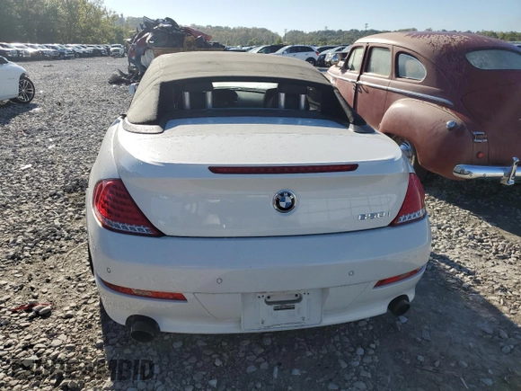 2010 BMW 6 Series 650i z VIN WBAEB5C50AC224807, wystawiony jako Copart lot #73411584 z przebiegiem 112 734 mil mil oraz Szkoda całkowita • Salvage title. Historia ofert i sprzedaży dostępna na DreamBid. Obrazek 6.