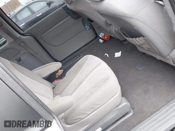 2012 Kia Sedona LX with VIN KNDMG4C72C6485952, listed as a IAAI auction lot 42029147 with 129,296 mi miles. Bid and sale history available at carsss.com. Image 8.