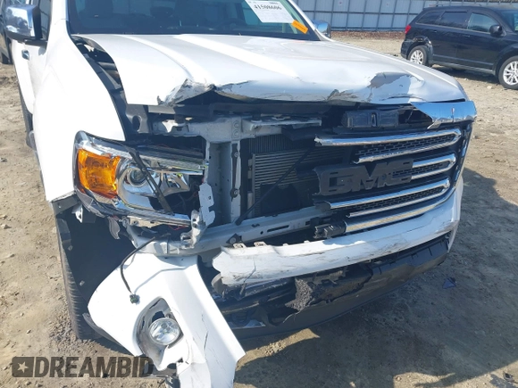 2015 GMC Canyon 4WD SLT with VIN 1GTG6CE30F1269698, listed as a IAAI auction lot 41508606 with 83,566 mi miles. Bid and sale history available at carsss.com. Image 6.