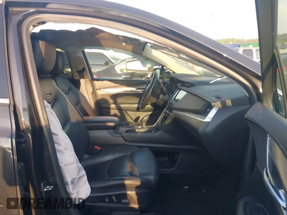 2019 Cadillac XT5 Luxury FWD z VIN 1GYKNCRS2KZ251207, wystawiony jako IAAI lot #42066271 z przebiegiem 128 226 mil mil oraz . Historia ofert i sprzedaży dostępna na DreamBid. Obrazek 5.