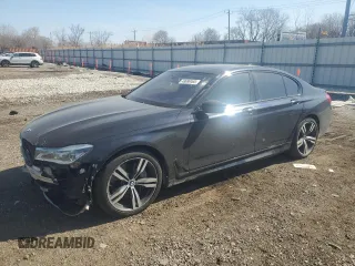 2016 BMW 7 Series 750i xDrive with VIN WBA7B0C51GG526703, listed as a Copart auction lot 48690465 with 73,853 mi miles and Salvage title. Bid and sale history available at DreamBid. Image 1.