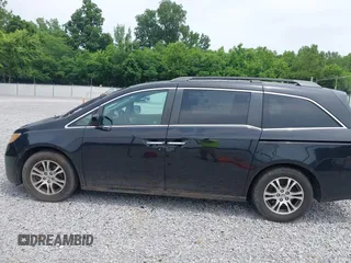 2012 Honda Odyssey EX-L with VIN 5FNRL5H66CB095996, listed as a IAAI auction lot 42446499 with 198,016 mi miles and . Bid and sale history available at DreamBid. Image 14.