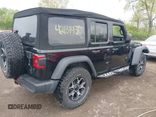 2021 Jeep Wrangler Unlimited Sport S z VIN 1C4HJXDG0MW788779, wystawiony jako IAAI lot #42137430 z przebiegiem 52 903 mil mil oraz . Historia ofert i sprzedaży dostępna na DreamBid. Obrazek 4.