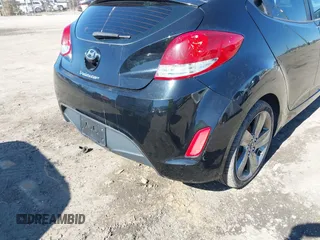2012 Hyundai Veloster w/Black Int с VIN KMHTC6AD8CU046029, выставлен на аукционе IAAI как лот 41664151 с пробегом 163 523 миль миль и . История ставок и продаж доступна на DreamBid. Изображение 6.
