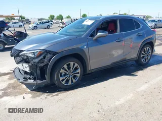 2021 Lexus UX 250h F Sport z VIN JTHR9JBH3M2052706, wystawiony jako IAAI lot #42321784 z przebiegiem 23 290 mil mil oraz . Historia ofert i sprzedaży dostępna na DreamBid. Obrazek 18.