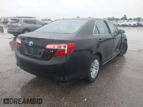 2014 Toyota Camry L with VIN 4T1BF1FK0EU823710, listed as a IAAI auction lot 42153523 with 105,468 mi miles and . Bid and sale history available at DreamBid. Image 4.