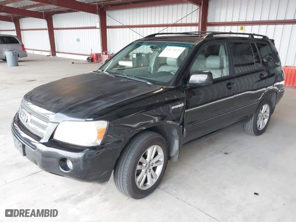 2007 Toyota Highlander Hybrid w/3rd Row with VIN JTEEW21A570035193, listed as a IAAI auction lot 41571679 with 143,627 mi miles. Bid and sale history available at carsss.com. Image 2.