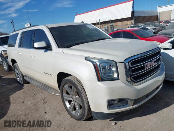 2015 GMC Yukon XL SLT with VIN 1GKS2HKC0FR179223, listed as a IAAI auction lot 40964120 with 184,592 mi miles. Bid and sale history available at carsss.com. Image 1.