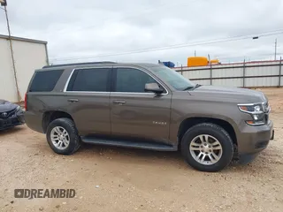 2015 Chevrolet Tahoe LT z VIN 1GNSCBKC2FR685780, wystawiony jako IAAI lot #42354130 z przebiegiem 101 617 mil mil oraz . Historia ofert i sprzedaży dostępna na DreamBid. Obrazek 13.