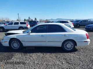 2005 Hyundai XG z VIN KMHFU45E85A386500, wystawiony jako IAAI lot #41658161 z przebiegiem 181 578 mil mil oraz . Historia ofert i sprzedaży dostępna na DreamBid. Obrazek 14.