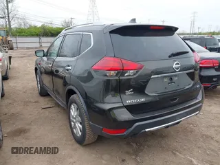 2017 Nissan Rogue S with VIN KNMAT2MTXHP501072, listed as a IAAI auction lot 42001030 with 163,204 mi miles and . Bid and sale history available at DreamBid. Image 3.
