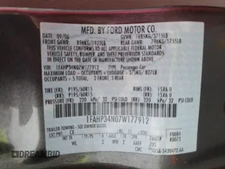 2007 Ford Focus S z VIN 1FAHP34N07W177912, wystawiony jako Copart lot #60481025 z przebiegiem 114 086 mil mil oraz Szkoda całkowita • Salvage title. Historia ofert i sprzedaży dostępna na DreamBid. Obrazek 13.