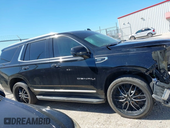 2021 GMC Yukon Denali with VIN 1GKS2DKL3MR409536, listed as a IAAI auction lot 41728940 with 62,244 mi miles. Bid and sale history available at carsss.com. Image 13.