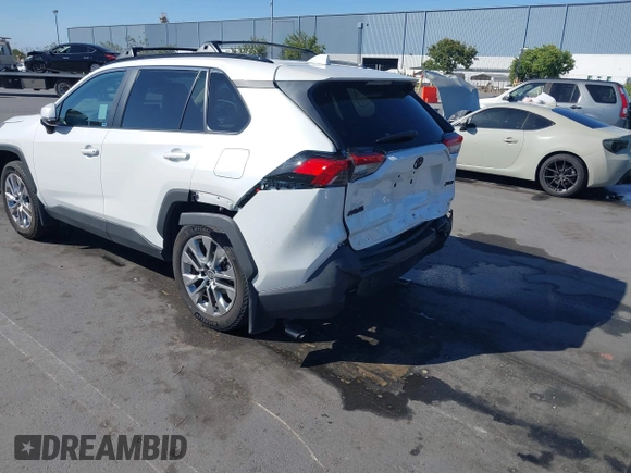 2023 Toyota RAV4 XLE Premium with VIN 2T3C1RFV7PW299428, listed as a IAAI auction lot 42527306 with 9,853 mi miles and . Bid and sale history available at DreamBid. Image 3.