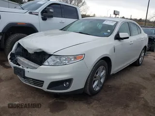 2012 Lincoln MKS with VIN 1LNHL9DR1CG803625, listed as a IAAI auction lot 41733683 with 199,590 mi miles. Bid and sale history available at carsss.com. Image 2.