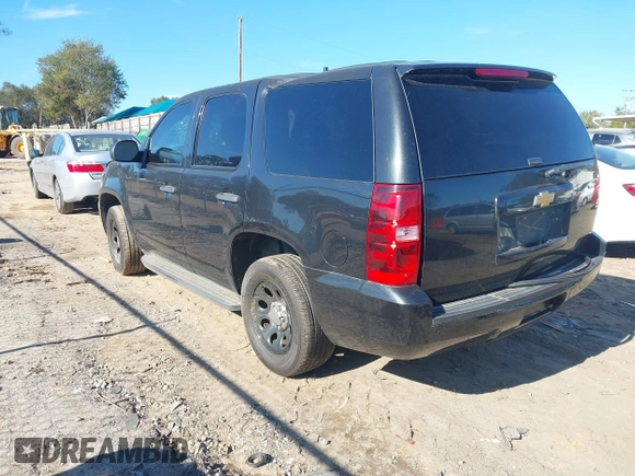 2013 Chevrolet Tahoe Commercial with VIN 1GNLC2E05DR266048, listed as a IAAI auction lot 40848505 with 95,459 mi miles and . Bid and sale history available at DreamBid. Image 3.