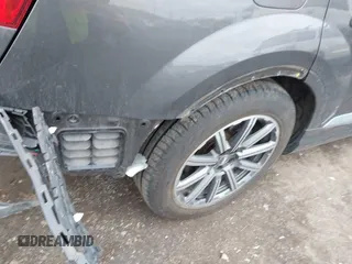 2018 Audi Q7 Premium Plus z VIN WA1LAAF76JD039992, wystawiony jako IAAI lot #41880935 z przebiegiem 74 095 mil mil oraz . Historia ofert i sprzedaży dostępna na DreamBid. Obrazek 6.