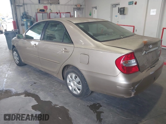 2004 Toyota Camry LE z VIN 4T1BE32K54U380439, wystawiony jako IAAI lot #42226118 z przebiegiem 262 644 mil mil oraz . Historia ofert i sprzedaży dostępna na DreamBid. Obrazek 3.