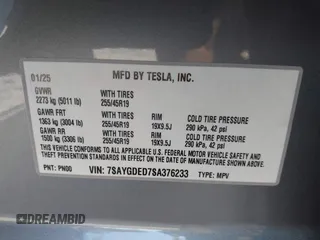2025 Tesla Model Y Long Range with VIN 7SAYGDED7SA376233, listed as a IAAI auction lot 41777876 with 70 mi miles and . Bid and sale history available at DreamBid. Image 9.