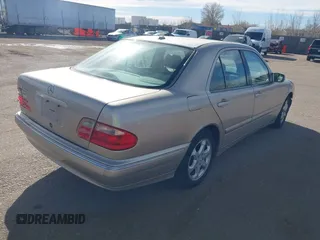 2002 Mercedes-Benz E-Class with VIN WDBJF65J92B479841, listed as a IAAI auction lot 41471955 with 203,527 mi miles. Bid and sale history available at carsss.com. Image 4.