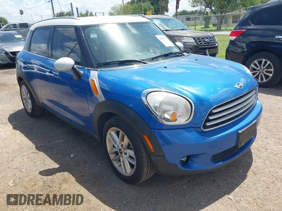 2014 MINI Countryman with VIN WMWZB3C52EWR40215, listed as a IAAI auction lot 42687571 with 106,338 mi miles and . Bid and sale history available at DreamBid. Image 1.