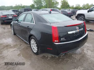 2013 Cadillac CTS Luxury z VIN 1G6DG5E50D0121280, wystawiony jako IAAI lot #42439031 z przebiegiem 75 211 mil mil oraz . Historia ofert i sprzedaży dostępna na DreamBid. Obrazek 3.