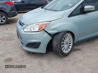 2014 Ford C-Max SE z VIN 1FADP5AU7EL508750, wystawiony jako IAAI lot #42139897 z przebiegiem 117 685 mil mil oraz . Historia ofert i sprzedaży dostępna na DreamBid. Obrazek 6.