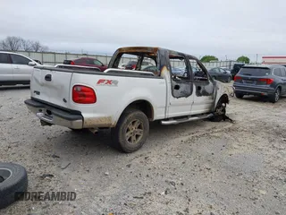 2002 Ford F-150 XLT with VIN 1FTRW08L32KE34232, listed as a IAAI auction lot 41930210 with 1 mi miles. Bid and sale history available at carsss.com. Image 4.