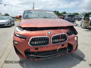 2018 BMW X2 sDrive28i with VIN WBXYJ3C37JEJ75554, listed as a Copart auction lot 58845425 with 90,110 mi miles and Salvage title. Bid and sale history available at DreamBid. Image 5.