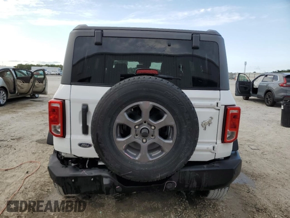 2024 Ford Bronco Big Bend z VIN 1FMDE7BH1RLA64327, wystawiony jako Copart lot #54401305 z przebiegiem 14 175 mil mil oraz Szkoda całkowita • Salvage title. Historia ofert i sprzedaży dostępna na DreamBid. Obrazek 6.