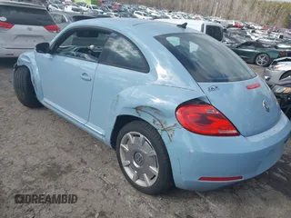 2012 Volkswagen Beetle 2.5L PZEV with VIN 3VWJP7AT6CM651620, listed as a IAAI auction lot 41395145 with 1 mi miles. Bid and sale history available at carsss.com. Image 3.