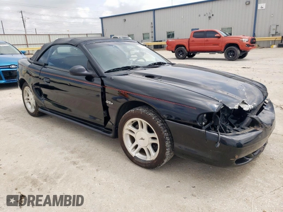 1998 Ford Mustang GT with VIN 1FAFP45X2WF272659, listed as a Copart auction lot 54121775 with 83,338 mi miles and Salvage title. Bid and sale history available at DreamBid. Image 4.