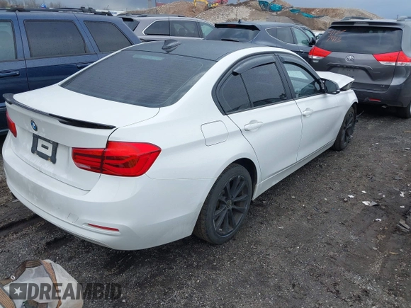2018 BMW 3 Series 320i xDrive with VIN WBA8E5G52JNU46803, listed as a IAAI auction lot 41869625 with 67,057 mi miles. Bid and sale history available at carsss.com. Image 4.