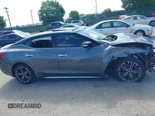 2018 Nissan Maxima SV with VIN 1N4AA6AP2JC385535, listed as a IAAI auction lot 42299100 with 81,431 mi miles and . Bid and sale history available at DreamBid. Image 14.