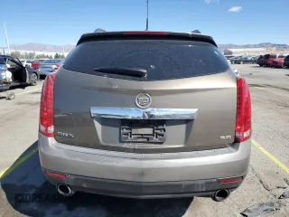 2014 Cadillac SRX z VIN 3GYFNAE37ES609830, wystawiony jako Copart lot #51542955 z przebiegiem 122 560 mil mil oraz Szkody całkowita. Historia ofert i sprzedaży dostępna na DreamBid. Obrazek 6.